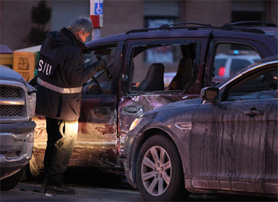 Investigator with flashlight