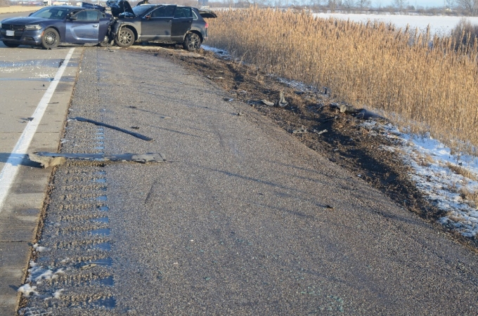 Debris and tire marks en route to stopping point of both vehicles.