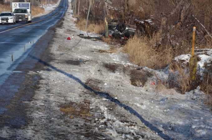 Location where the Kia came to rest after striking the hydro pole and entering the ditch, flipping onto its roof.