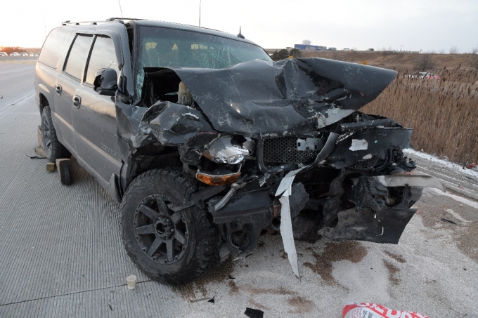 CW #1's GMC Yukon Denali after it rear-ended the SO's vehicle.