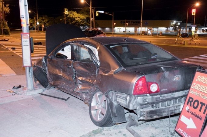 Figure 2 - The Chevrolet Malibu with extensive damage to its driver’s side.