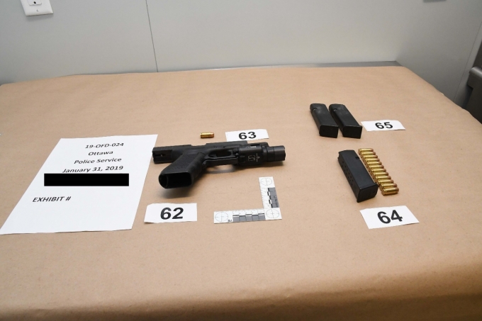 Figure 3 – SO #1’s Glock pistol with magazines and ammunition.