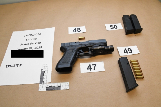 Figure 4 – SO #2’s Glock pistol with magazines and ammunition.