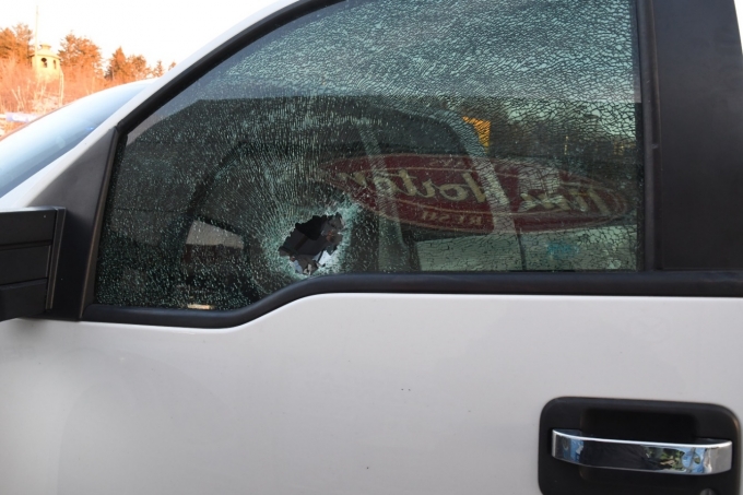 Figure 5 - The driver's-side window with a hole just above the frame.
