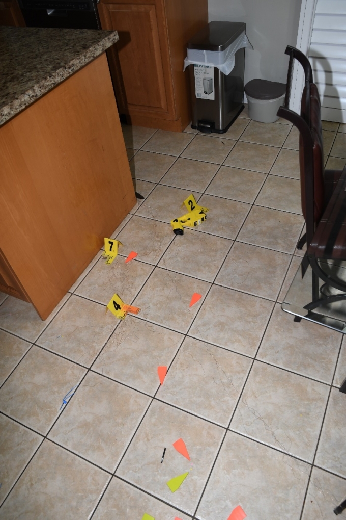 Figure 2 - The location of the second CEW (2) and a cartridge case (7).
