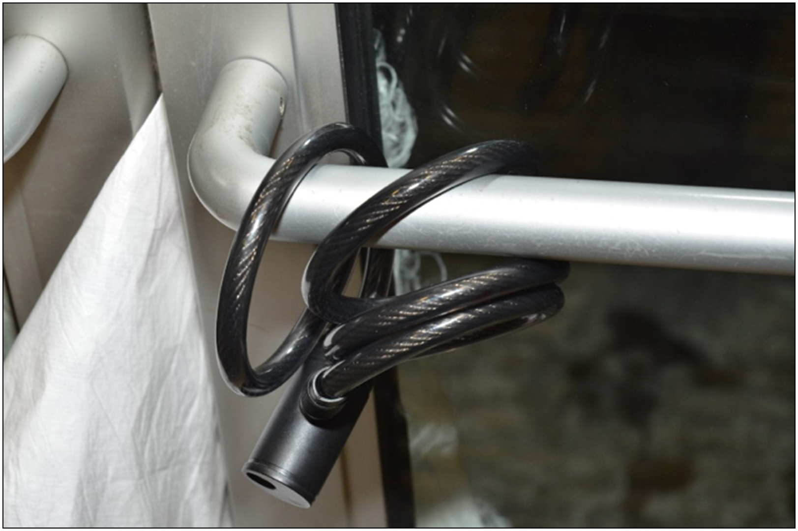 the bicycle lock used to secure the doors to the bank