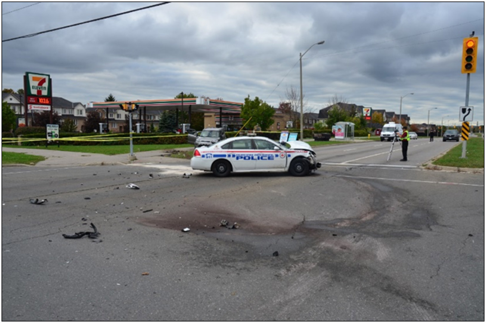 The police cruiser came to rest in the southbound Harwood Avenue lanes of traffic