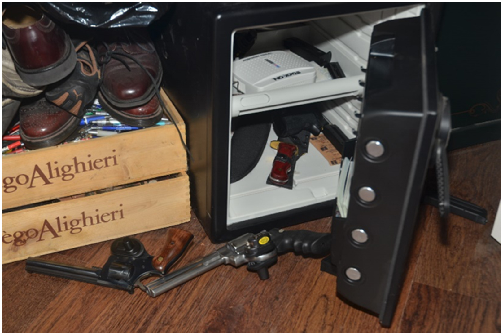 Other handguns found in an open firearm safe in the basement