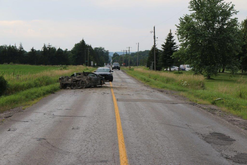Photos of damaged Lamborghini at scene