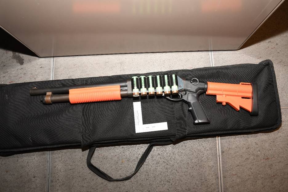 Figure 4 – The SO’s Remington LL shotgun with six rounds in the side saddle